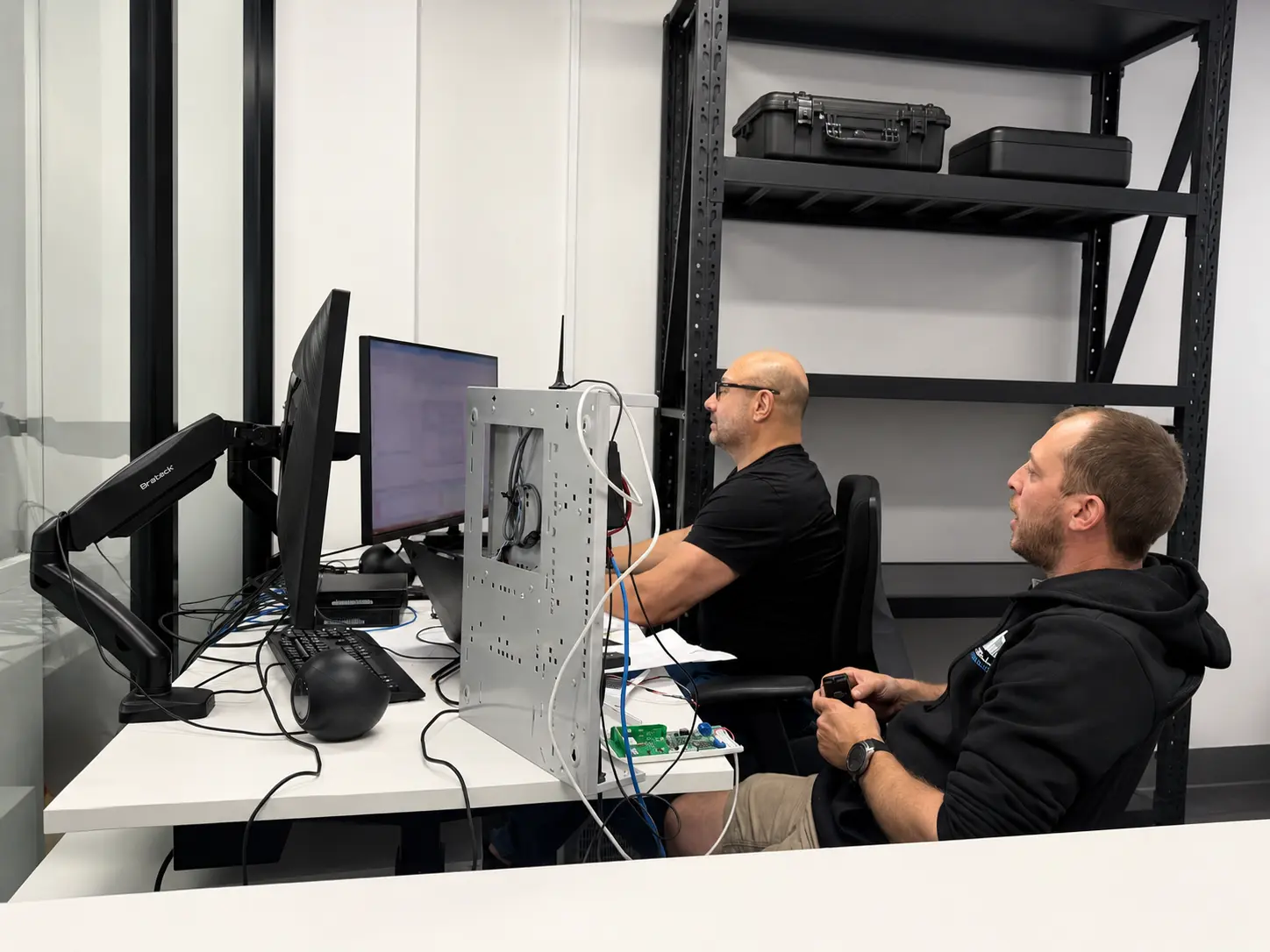 Safeguard technicians completing pre-deployment system testing