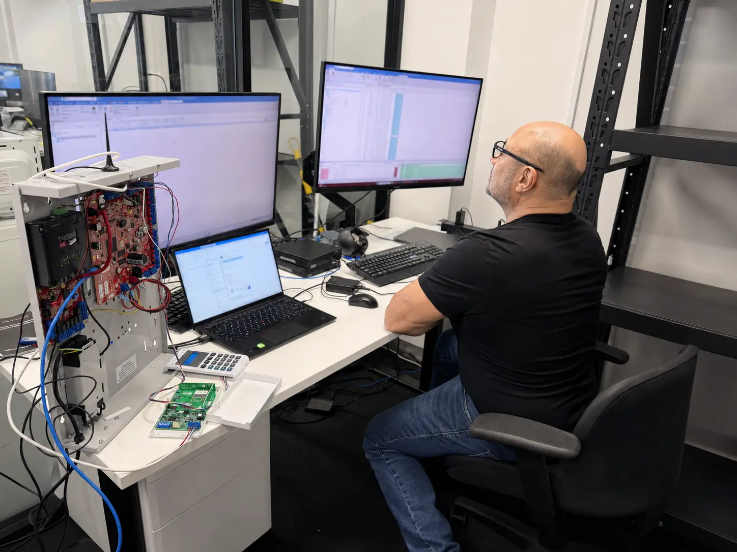 Safeguard technician programming and network-testing a security control system